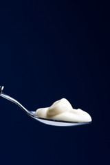 Spoon with yogurt