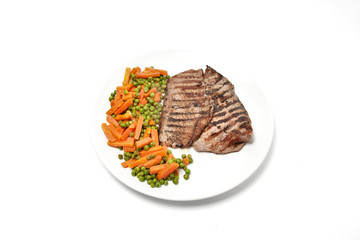 Grilled beef steak served with vegetables