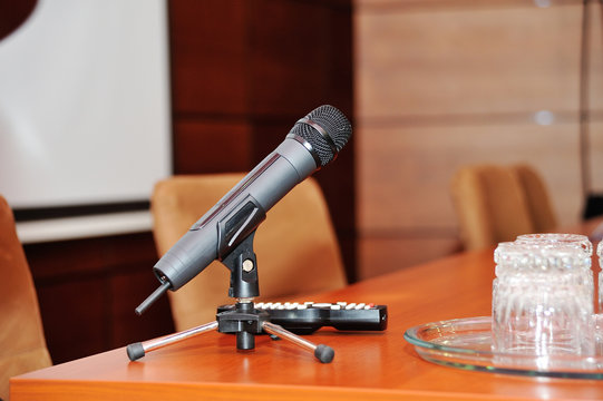 Microphone on tripod stand on a table