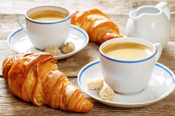 fresh Breakfast with croissants, espresso and milk