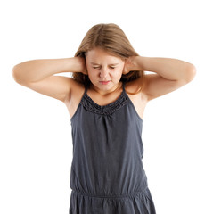 girl closing her ears