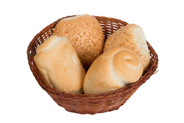 bread in a wicker basket isolated on white background