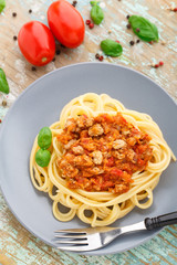 Spaghetti bolognese with basil leave