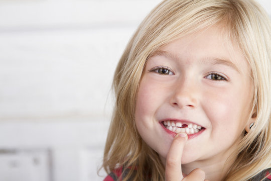 Child missing front tooth