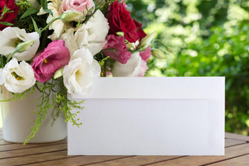 Envelope and flower bouquet