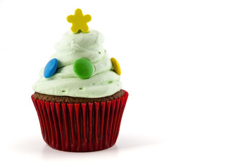 cupcake with green cream isolated on white background