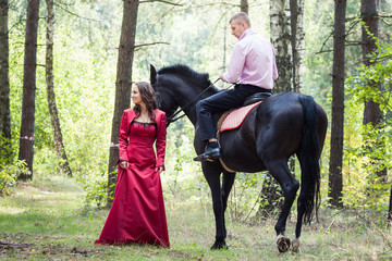 man on horse and girl