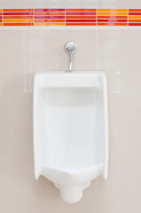 White porcelain urinals