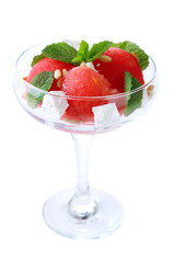 Salad with watermelon, feta and mint leaves in cocktail glass,