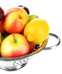 Assortment of juicy fruits isolated on white