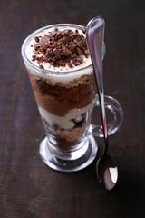 Yogurt, with chocolate cream, chopped chocolate and muesli