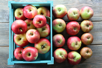 Juicy apples in box, close-up