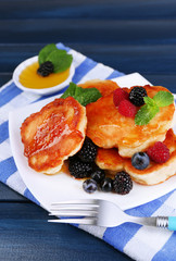 Tasty pancake with fresh berries and mint leaf