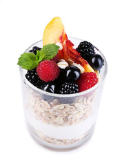 Healthy breakfast - yogurt with  fresh fruit, berries and