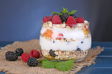Healthy breakfast - yogurt with  fresh fruit, berries and