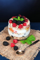 Healthy breakfast - yogurt with  fresh fruit, berries and