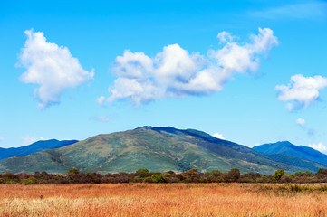 Landscape with mountain views, blue sky and beautiful clouds.