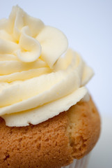 Obraz na płótnie Canvas Closeup cupcake with vanille buttercream.
