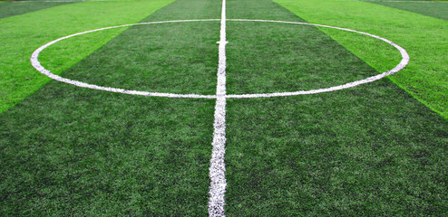 Obraz premium Green sports field with artificial grass