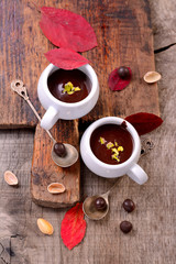 flavored hot chocolate in small ceramic chashkahna wooden table
