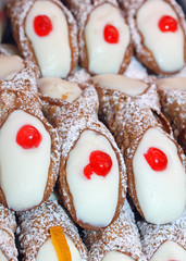 Great Sicilian cannoli with the icing and cream dessert
