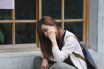 Fototapeta premium Woman of Asian sitting bench ,worry