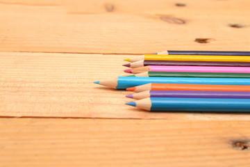 Obraz premium Colored pencils on wood