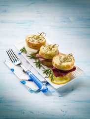 mixed potatoes sandwich with bresaola parma ham and cheese