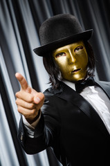 Funny concept with theatrical mask