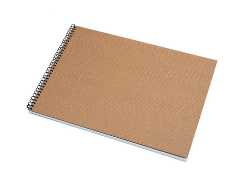 recycled paper notebook front cover on white background