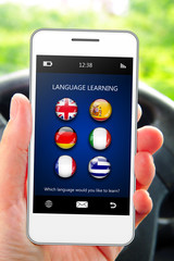 hand holding mobile phone with language learning application