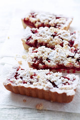 Shortcrust plum cake with coconut crumble
