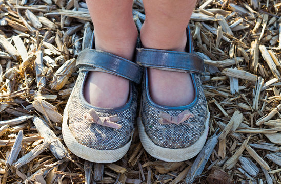Close-up of a little girl's shoes