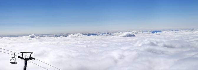 Fototapeta na wymiar Panorama of mountains under clouds at nice sun day