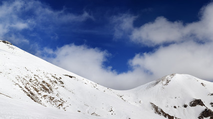 Fototapeta na wymiar Panorama of mountain pass and off-piste slope