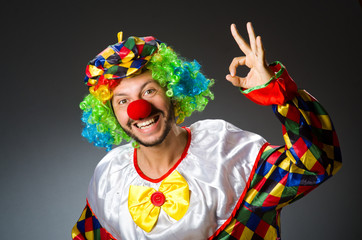 Funny clown in colourful costume