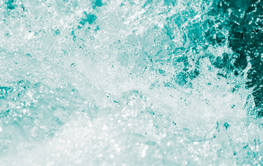 background of stormy water with splashes