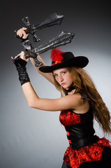 Woman pirate with sharp weapon