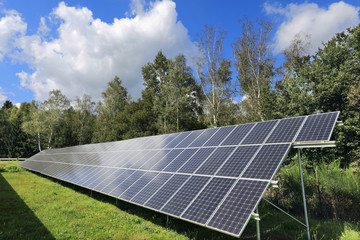 Detail of Solar Power Station on the summer Meadow