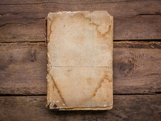 Old book on wood background