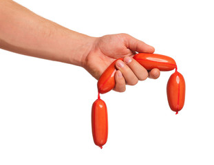 Hand with sausage