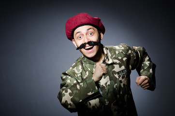 Funny soldier in military concept