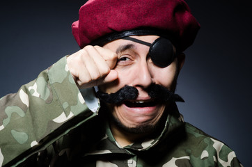Funny soldier in military concept