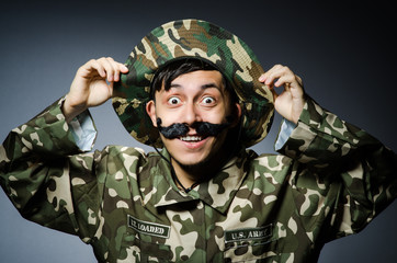 Funny soldier in military concept