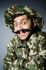 Funny soldier in military concept