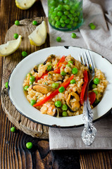 Paella with mussels and green peas