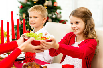 smiling family having holiday dinner at home