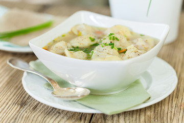Dish of savory pork tortellini in broth pelmeni russian