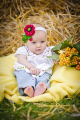 Baby girl in the haystack