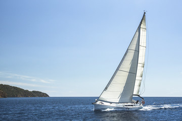 Boat in sailing regatta. Luxury yachts at Sea.